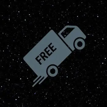 Gray truck with ’free’ sign on side, starry night background